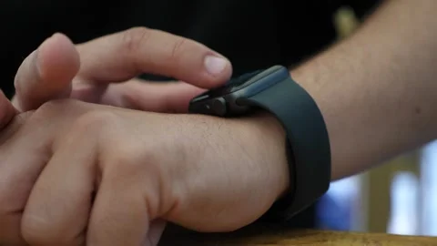 Close up of Hands of Man using Smart Watch. Slow motion Video stock 135340334