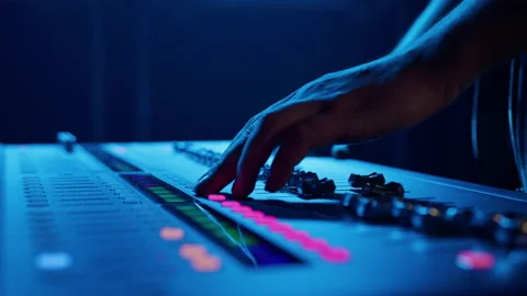 Close-up of the hands of a man who presses the buttons of the sound controller Stock Footage 203810034