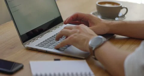 Close up of hands of man working on laptop.Guy typing text on personal computer Stock-Footage 160920195