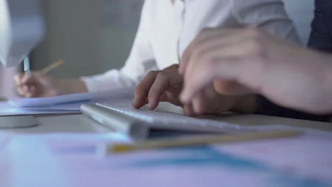 Close-up of hands of managers typing on keyboard in a business office. Video stock 87394766