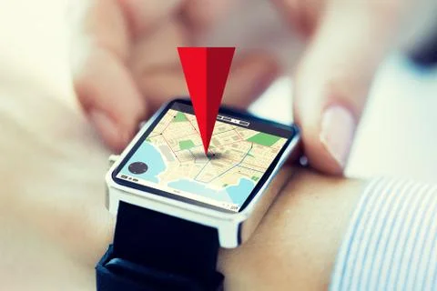 Close up of hands with map on smartwatch screen Foto stock