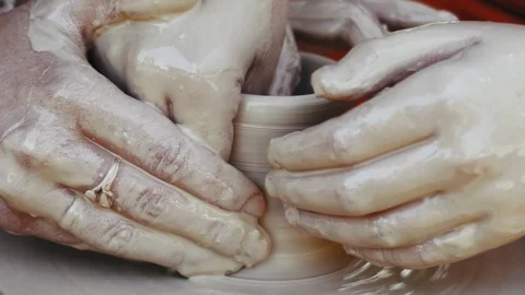 Close-up, Hands of the Master Help the Apprentice in the Pottery Craft on the Video stock 122110734