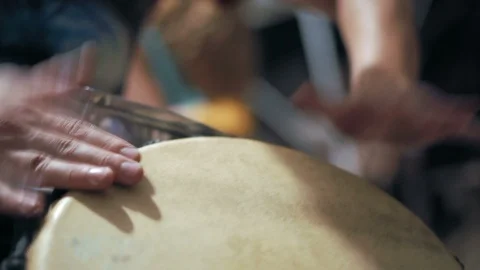 Close-up, Hands of Men Drumming on the Drum Stock Footage 95205670