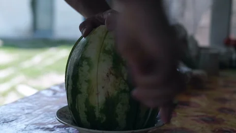 Close-up, Hands of Men Hold Cut-to-pieces Ripe Watermelon Stock Footage 88199466