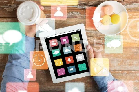 Close up of hands with menu icons on tablet pc Stock Photos