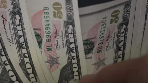 Close-up of hands meticulously counting hundred dollars bills. Cash money B.. Stock Footage 266473784