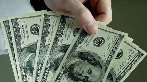Close-up of hands meticulously counting hundred dollars bills. Cash money B.. Stock Footage 266473895