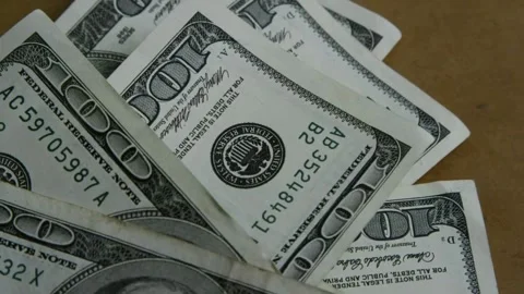 Close-up of hands meticulously counting hundred dollars bills. Cash money B.. Stock Footage 266473954