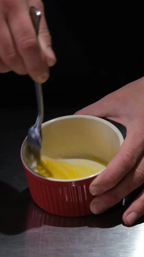 Close-up of hands mixing eggs in red spot. Part of preparation, cuisine cooking Stock-Footage 163301000