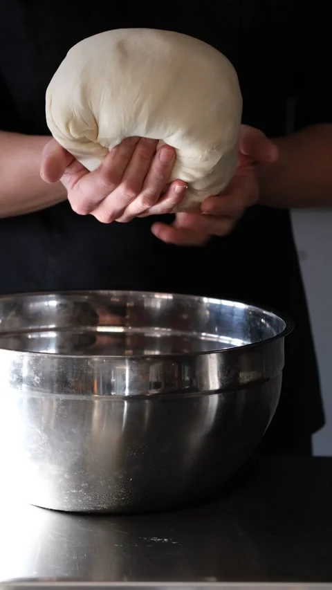 Close-up of hands mixing eggs in red spot. Part of preparation, cuisine cooking Stock-Footage 163301892