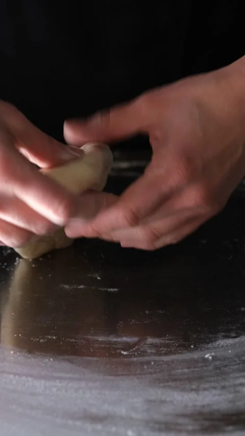 Close-up of hands mixing eggs in red spot. Part of preparation, cuisine cooking Stock-Footage 163302098