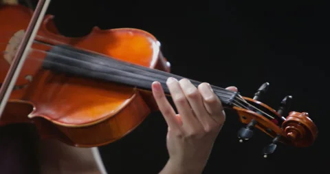 Close-up of the hands of a musician playing a classical violin. Stock Footage 264257516