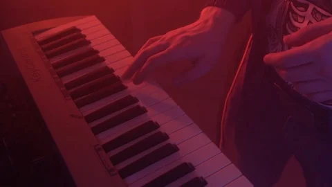 Close-up hands of musician who plays keyboards. Stock Footage