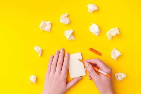 Close up of hands with notebook. birth of an idea on paper Stock Photos