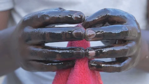 Close-up hands from oil and using wipes 스톡 동영상 97244982
