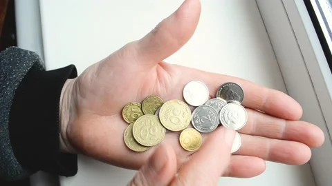 Close-up hands of old women counting Ukrainian money kopiikas Stock Footage 181612098