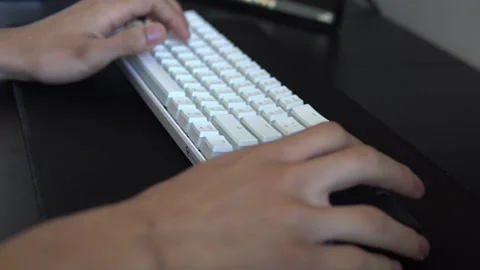 Close Up of Hands Operating Compact Keyboard and Mouse Stock Footage 341707149