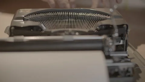 Close Up of Hands Operating a Vintage Mechanical Typewriter 库存影片 344626054
