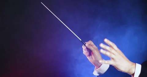 Close up hands of orchestra conductor with copy space.  Stock Footage 131363027