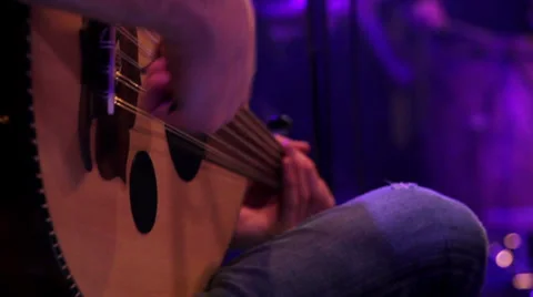 Close-up on the hands of an oud player Stock Footage 35792562