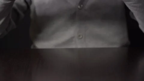 Close-up of Hands with Pen on Paper Documents Sitting Stock Footage 167885195