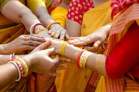 Close up of hands performing a wedding ritual. Stock Photos
