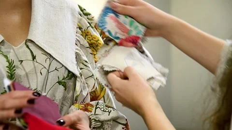 A close-up of the hands of a person engaged in creative activities related .. 動画素材 339766452