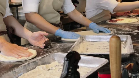 Close up of hands Pizza Chefs Forming dough in Restaurant Kitchen Video stock 341542607
