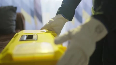Close Up of Hands Placing Toolbox on a Chair and Inspecting Tools Video stock 329673607