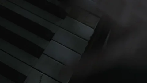 Close-up. Hands play on a vintage piano Stock Footage