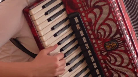 Close up on hands playing accordion 動画素材 78234363