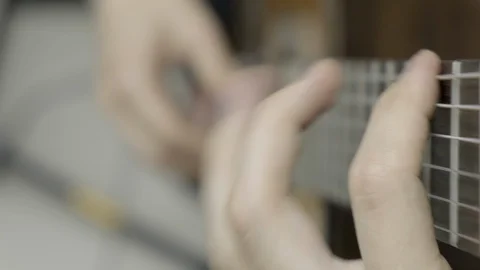 Close-up of hands playing classical guitar Stock Footage 114634751