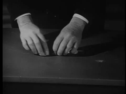 Close-up of hands playing game with walnut shells Stock Footage 260251639