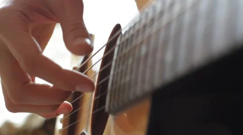 Close up of hands playing guitar Stock Footage 59764235