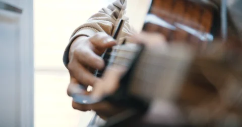 Close up of hands playing guitar Stock Footage 96578960