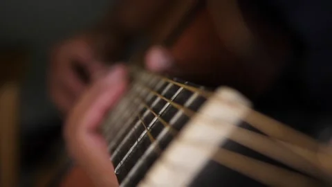 Close up of hands playing guitar Stock Footage 160564042
