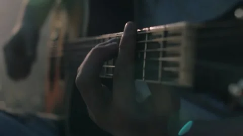 Close up hands playing the guitar, soft focus Stock Footage 138158858