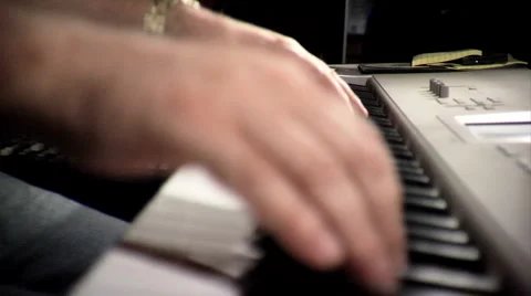 Close Up of Hands Playing a Keyboard Video stock 6416855