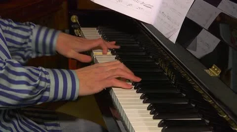 Close up of hands playing the piano Stock Footage