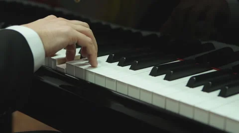 Close up hands playing the piano Vídeo Stock 60288961