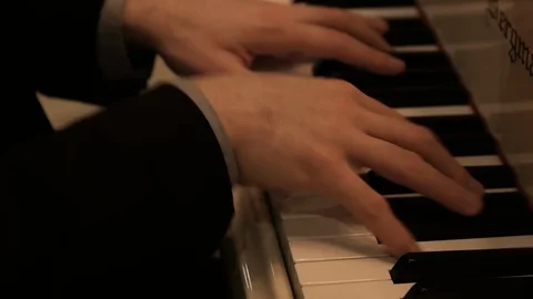 Close up of hands playing the piano keys Stock Footage 103548873