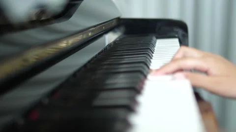 Close Up of Hands Playing Piano Keys, Soft Focus Classical Music Performance Video stock 308075172