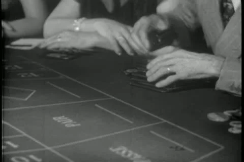 Close-up of hands playing roulette in casino 動画素材 11352946