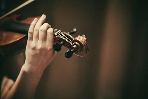 Close-up of hands playing the violin Stock Photos