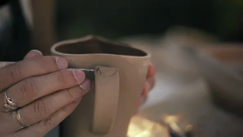 Close-up, Hands of The Potter Woman Processing Clay Mug Stock Footage 125131256