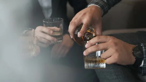 Close-up of hands pouring soft drink into a bowl Stock Footage 196802980