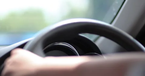 Close-up of hands practicing steering while learning to drive. Concept of b.. Stock Footage 340526025