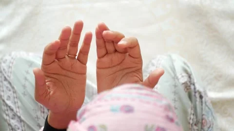 Close up of hands praying, devotional moment, cultural ritual, serene spiri.. Stock Footage 332882137
