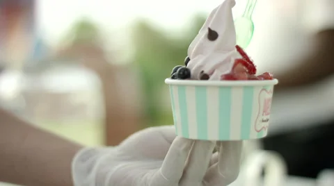 Close up of hands preparing ice cream. Stock Footage 63636939