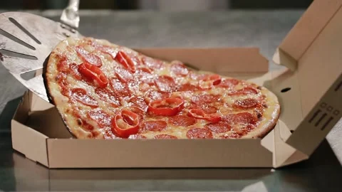 Close up hands professional chef puts just now cooked pizza from oven Stock Footage 134681659